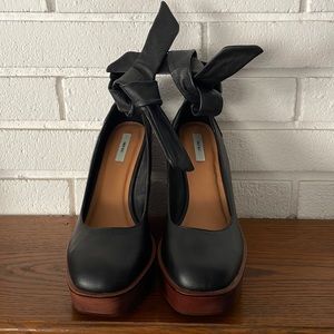 Brand new Kimchi Blue Black & Brown Wooden heeled shoes.
